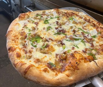 Fresh pie coming out of the oven at Amore